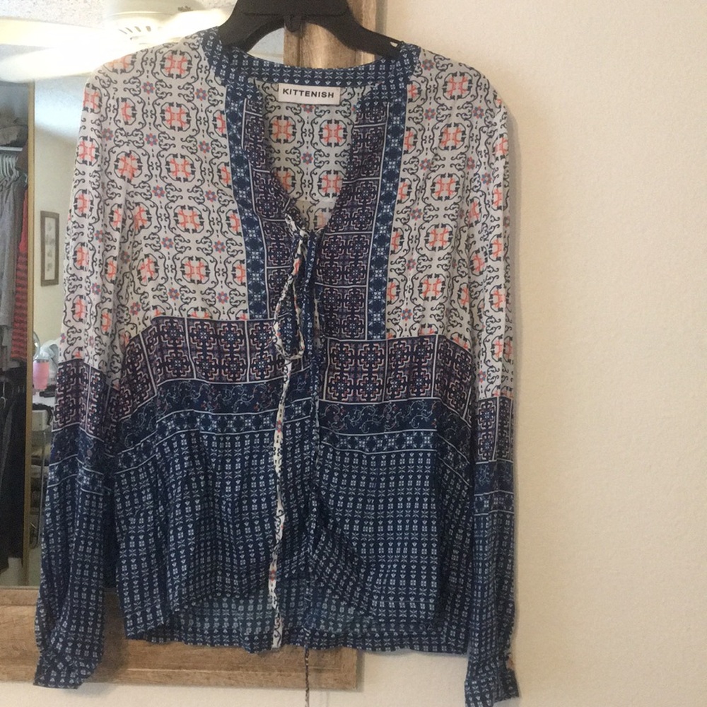 Kittenish resort lace up top